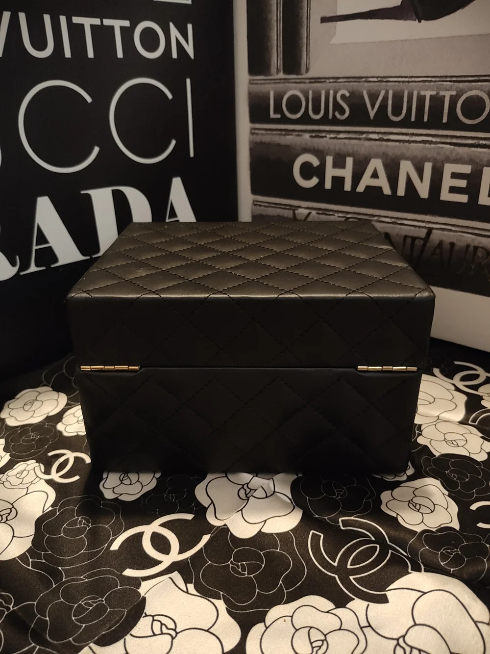 Black Quilted Jewelry Case with Gold Logo Accents And Mirror